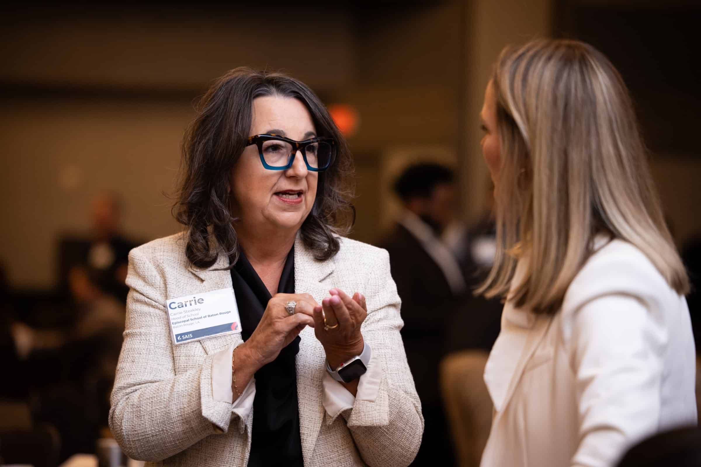 Carrie Steakley chats with fellow conference attendee during 2025 SAIS Annual Conference